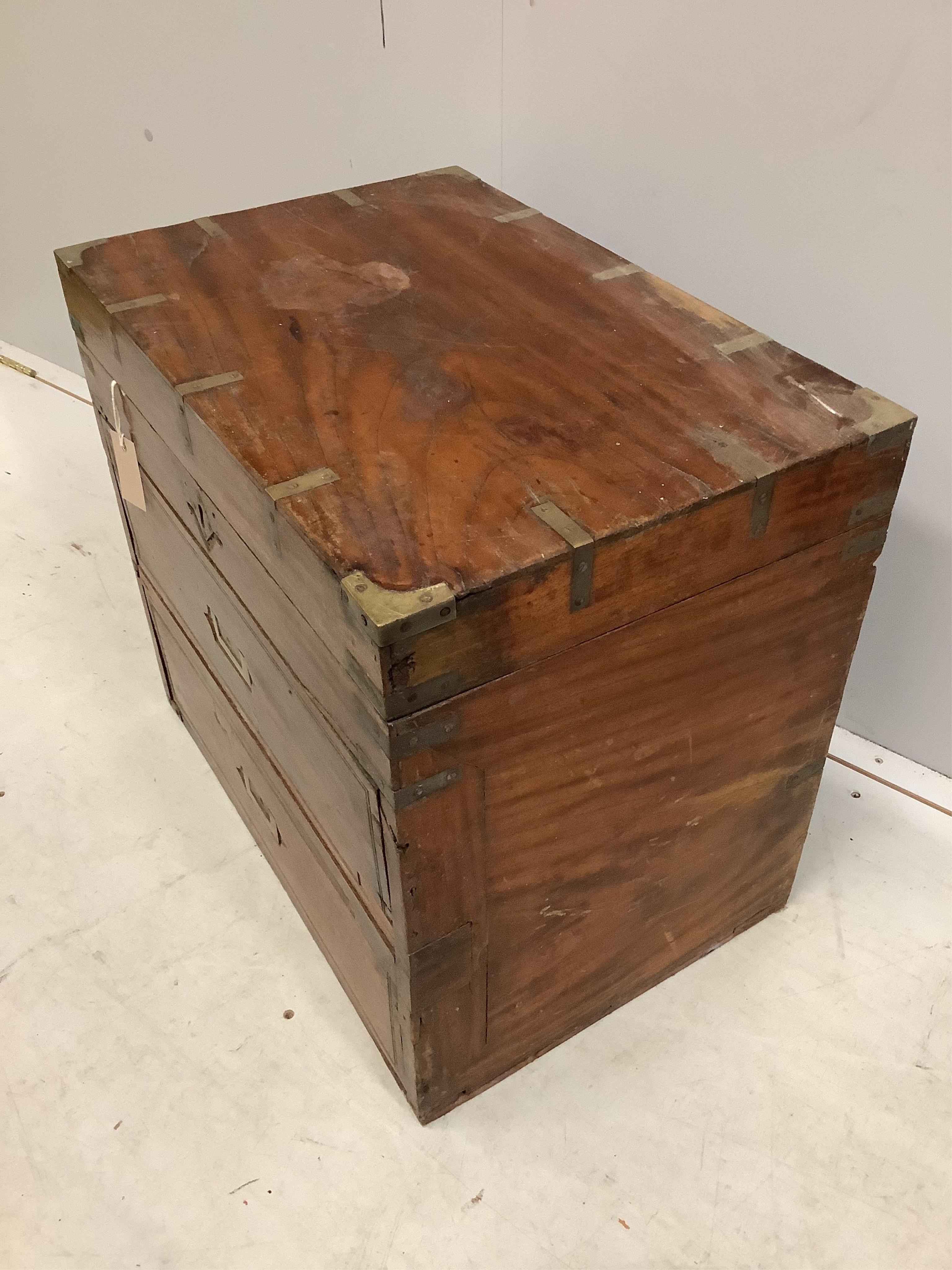 A 19th century brass mounted teak trunk with dummy drawer front, width 60cm, depth 41cm, height 54cm. Condition - fair